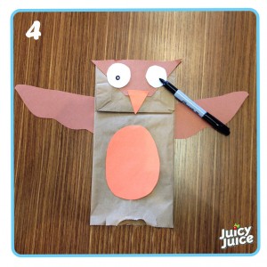 Picture of brown paper bag and construction paper cutouts